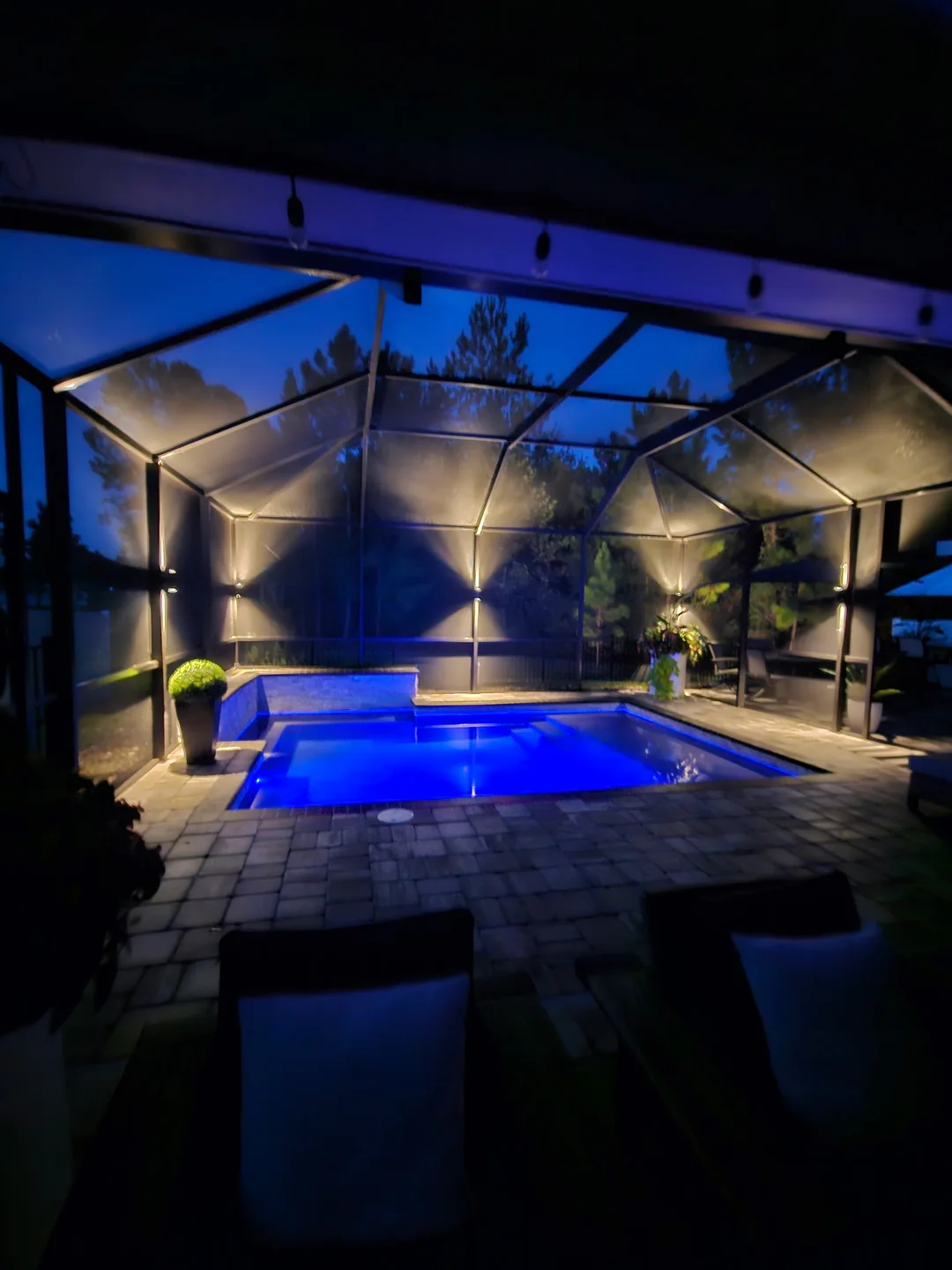 The enclosure from the deck, sconces on every upright