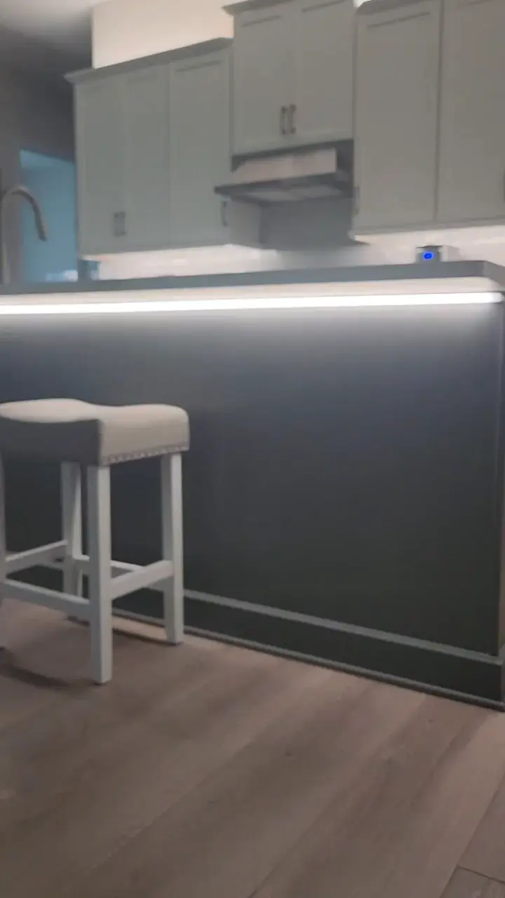 Kitchen cove and under-cabinet lighting changing scenes in the smart home demo